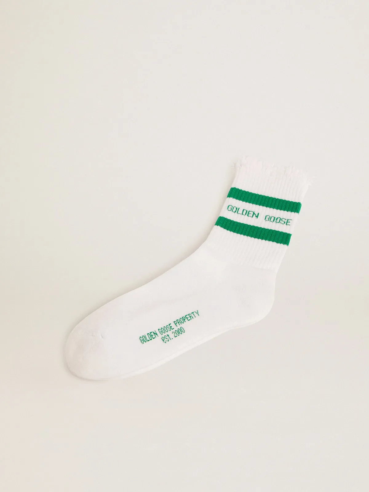 Cotton socks with distressed finishes, green stripes and logo  